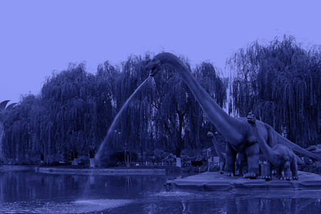 BEIJING - OCTOBER 23: Dinosaur model in a park, on october 23, 2014, Beijing, China.のeditorial素材