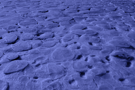 ice and snow natural landscape by the sea, closeup of photoの写真素材