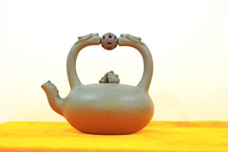 Close up to a purple clay teapotのeditorial素材