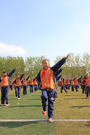 Luannan County - April 18, 2016: student group gymnastics training on the playground, in a middle school, Luannan County, Hebei Province, China

のeditorial素材