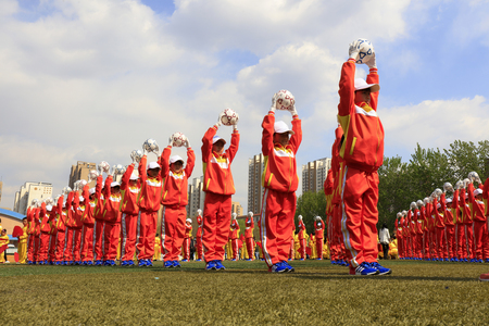 Luannan County - April 18, 2016: student group gymnastics training on the playground, in a middle school, Luannan County, Hebei Province, China

のeditorial素材