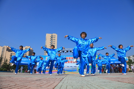 Luannan County - August 8, 2017:  body building exercise show in a park, Luannan County, Hebei Province, china.
のeditorial素材