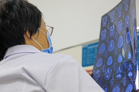 Luannan County - May 016: doctors looking at CT, Luannan, Hebei, China

のeditorial素材