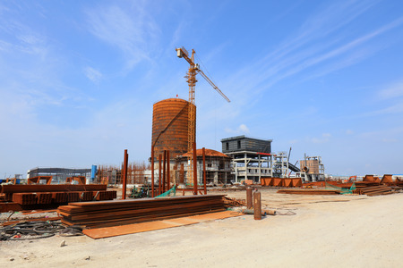 Luannan County - August 19, 2017: industrial buildings and vehicles in the outdoors, Luannan, Hebei,...