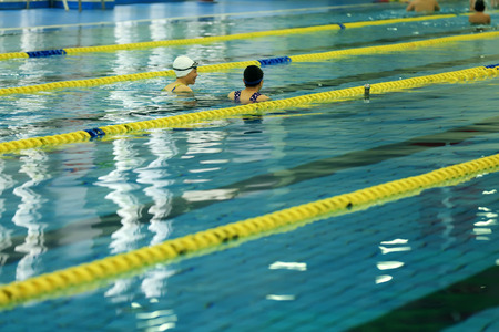 A lady with a rest in the poolのeditorial素材