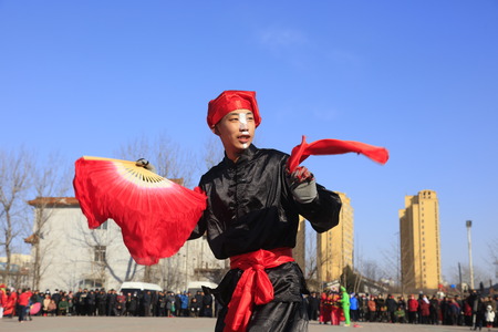 Luannan County - February 9, 2017: Chinese folk dance Yangko performance on the street, Luannan County, Hebei Province, Chinaのeditorial素材