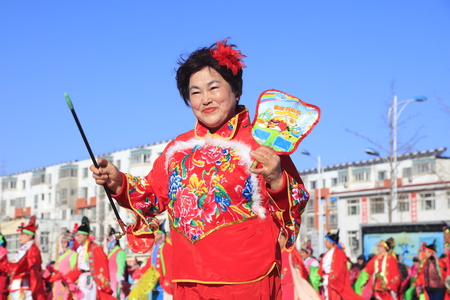 Luannan County - February 10, 2017: Chinese folk dance Yangko performance on the street, Luannan County, Hebei Province, Chinaのeditorial素材
