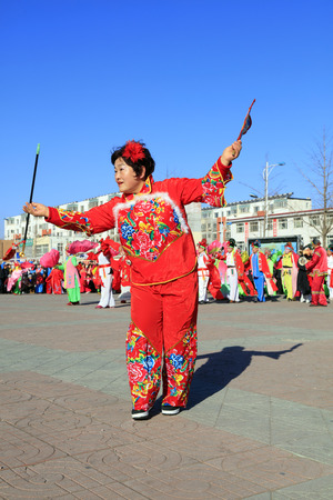 Luannan County - February 10, 2017: Chinese folk dance Yangko performance on the street, Luannan County, Hebei Province, Chinaのeditorial素材