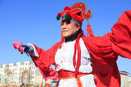 Luannan County - February 10, 2017: Chinese folk dance Yangko performance on the street, Luannan County, Hebei Province, Chinaのeditorial素材