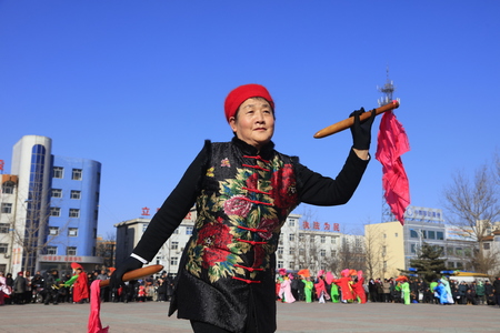 Luannan County - February 10, 2017: Chinese folk dance Yangko performance on the street, Luannan County, Hebei Province, Chinaのeditorial素材