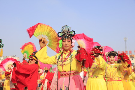 Luannan County - February 13, 2017: Chinese folk dance Yangko performance on the street, Luannan County, Hebei Province, Chinaのeditorial素材
