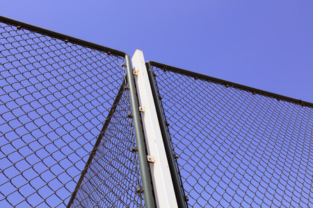 Metal protective net in blue sky background
