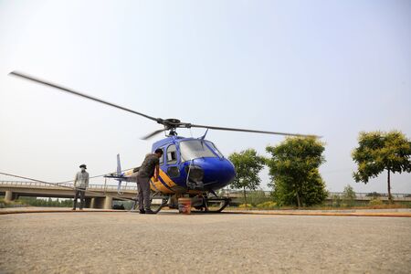 Luannan County - June 11, 2018: Agricultural Helicopter Adding Pharmaceutical Solution, Luannan...