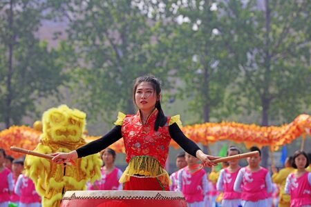 Tangshan City - April 26, 2018: large group of gymnastic performances at the middle school sports meeting, Tangshan City, Hebei, Chinaのeditorial素材