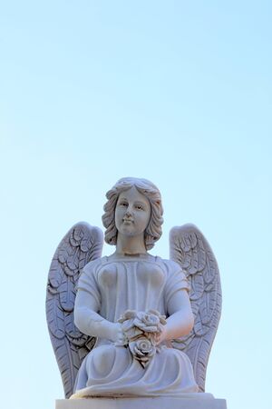 Angel sculpture is in a church.の写真素材