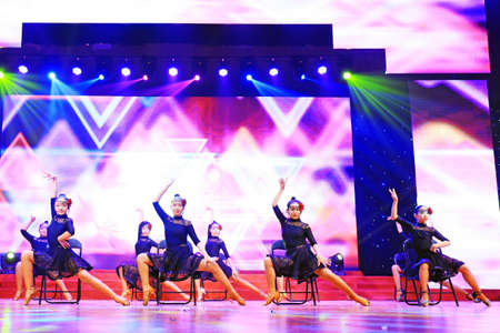 Luannan County - January 27, 2019: children latin dance performance on the stage, Luannan County, Hebei Province, Chinaのeditorial素材
