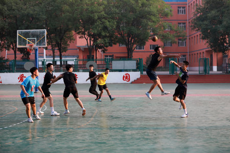Luannan County, China-September 23, 2019: Handball players of middle school students are training, Luannan County, Hebei Province, Chinaのeditorial素材