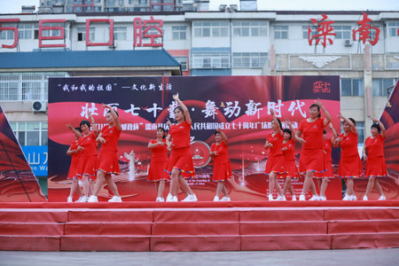 Luannan County, China-August 20, 2019: Ladies are dancing fitness in the square, Luannan County, Hebei Province, Chinaのeditorial素材