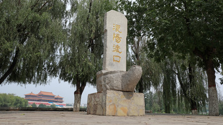 Fengrun County, China-September 15, 2019: "GangYang ferry crossing" words on the Stone Stele in a park, Fengrun County, Hebei Province, Chinaのeditorial素材