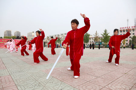 LUANNAN COUNTY, China-October 15, 2017: Taiji Sword performance in the square, LUANNAN COUNTY, Hebei Province, Chinaのeditorial素材