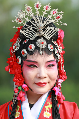 Luannan County, China-June 26, 2019: Peking Opera performers rehearse in the park, Luannan County, Hebei Province, Chinaのeditorial素材