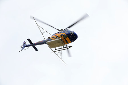 Agricultural helicopters fly in the skyのeditorial素材