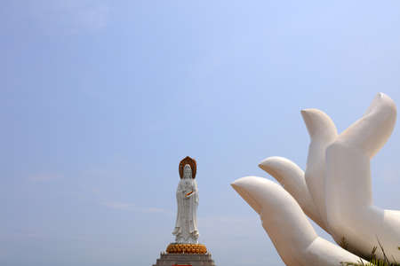 Guanyin sculpture on the sea in Nanshan tourist area, Sanya City, Hainan Province, Chinaの写真素材