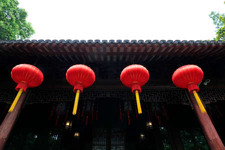 Chinese traditional red lanterns under the eaves of classical houses in Yu Garden, Shanghai, Chinaの写真素材
