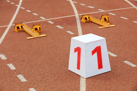 Track numbers and starters on the plastic track on the playground