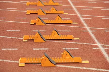 The starting gear is on the plastic track on the playgroundの写真素材