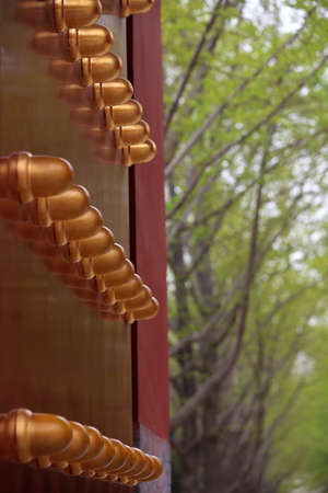Red wooden palace gate in Ditan Park, Beijing, Chinaのeditorial素材