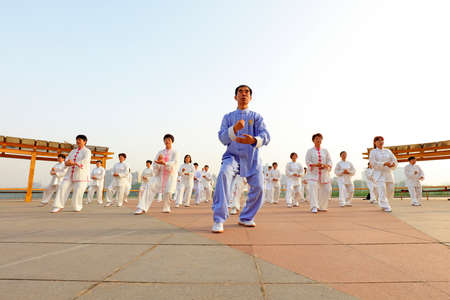 LUANNAN COUNTY, China-May 27, 2018: People practice Taijiquan in the park, LUANNAN COUNTY, Hebei Province, Chinaのeditorial素材