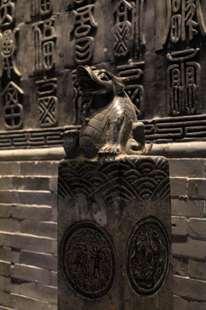 Fengrun District, China-December 22, 2020: Traditional Chinese stone carvings are in a park, Hebei Province, Chinaのeditorial素材