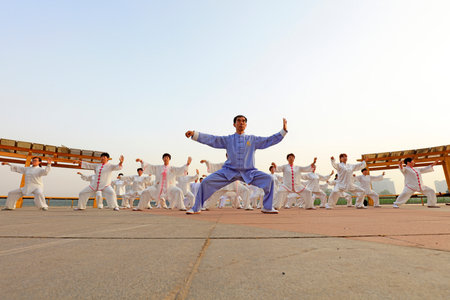 LUANNAN COUNTY, China-May 27, 2018: People practice Taijiquan in the park, LUANNAN COUNTY, Hebei Province, Chinaのeditorial素材