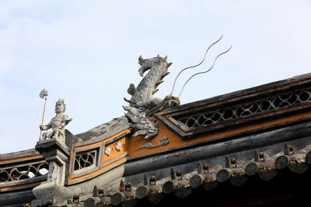 Shanghai, China-June 2, 2018: The sculpture on the roof ridge is in Chenxiang Pavilion, Shanghai, Chinaのeditorial素材