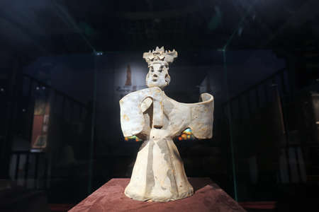 Guangzhou City, China-April 5, 2019: China's Eastern Han Dynasty ceramic singer sculpture in the Museum, Guangzhou City, Guangdong Province, Chinaのeditorial素材
