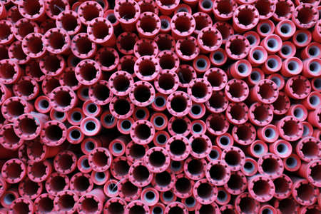 Colored spools piled up in a spinning millの写真素材