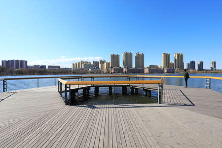 The wooden platform is in a water park, North Chinaのeditorial素材