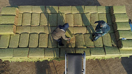 LUANNAN COUNTY, Hebei Province, China-March 20, 2020: Farmers use machinery to crush corn straw to make animal feed.のeditorial素材