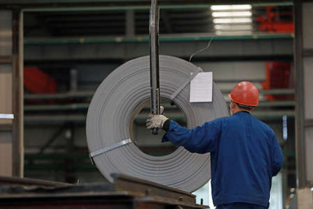 LUANNAN COUNTY, Hebei Province, China-March 26, 2020: Workers are busy on the strip production line...