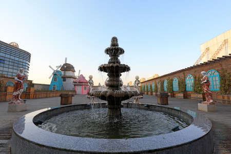 The fountain is built in a gardenのeditorial素材