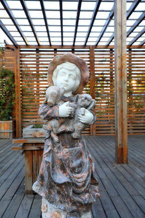 Tangshan City, Hebei Province, China-November 4, 2020: girl cartoon sculpture in a parkのeditorial素材