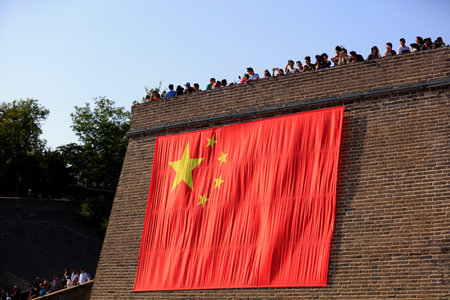Qinhuangdao City, China-October 4, 2018: A huge five-star red flag is hanging on the Great Wall, Qinhuangdao City, Hebei Province, Chinaのeditorial素材
