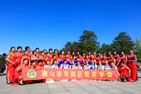 Tangshan City, China-October 7, 2018: Women's cheongsam show in the park, Tangshan City, Hebei Province, Chinaのeditorial素材