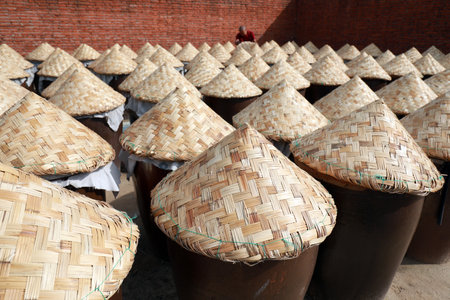 Containers of marinated shrimp oil piled up in the yard, North Chinaの写真素材