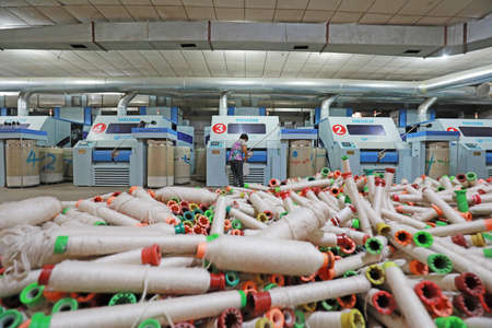 LUANNAN COUNTY, Hebei Province, China-July 17, 2020: Women workers are busy in the production line...