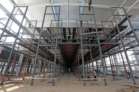 LUANNAN COUNTY, Hebei Province, China-August 11, 2020: Workers are busy at the factory building site