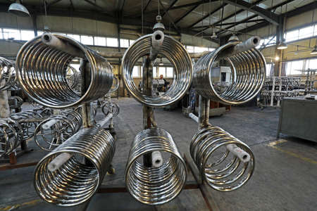 LUANNAN COUNTY, Hebei Province, China-September 29, 2020: Workers are busy on the yacht steering wheel parts production lineのeditorial素材