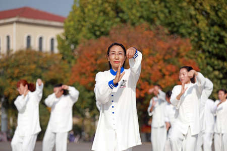 LUANNAN COUNTY, Hebei Province, China-October 18, 2020: People are practicing Taijiquan in the squareのeditorial素材