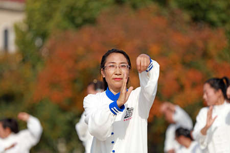 LUANNAN COUNTY, Hebei Province, China-October 18, 2020: People are practicing Taijiquan in the squareのeditorial素材